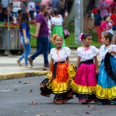 Girls in traditional dress in Costa Rica